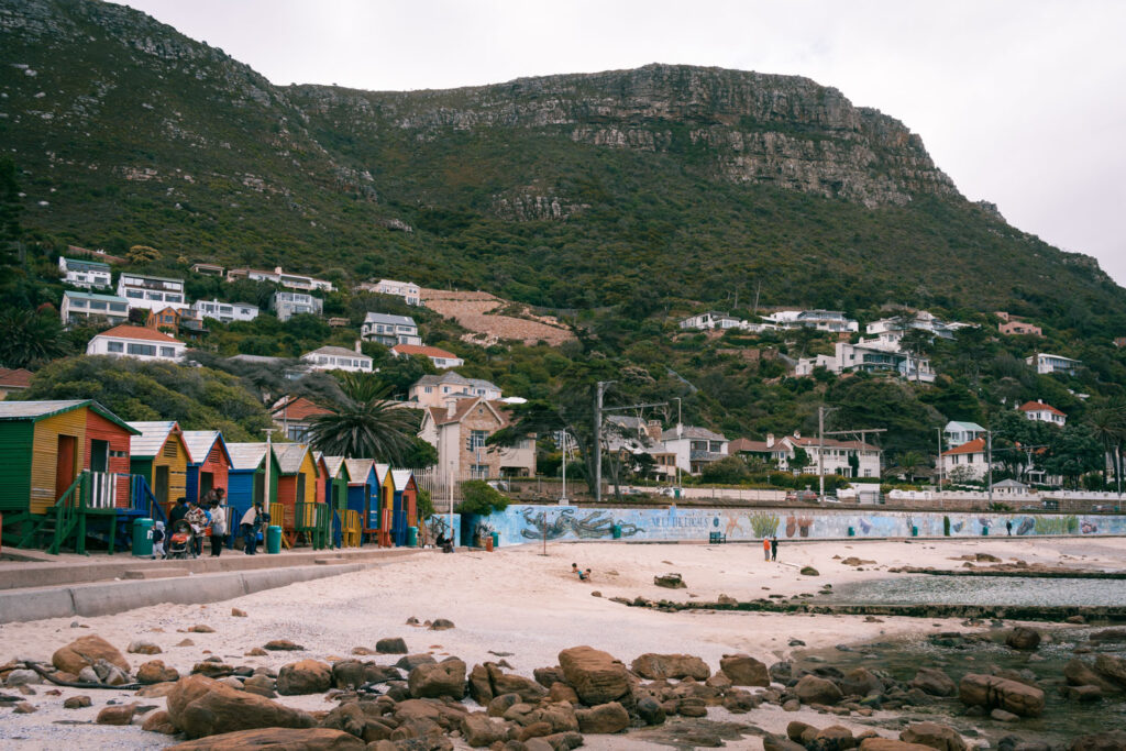 Overview of St. James beach with instagram famous coloured changing rooms