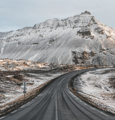 First rays of sunlight on a road on the Snæfellsnes peninsula