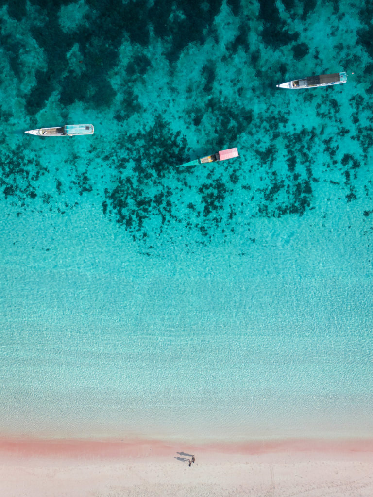 Boats docked on Pink Beach.