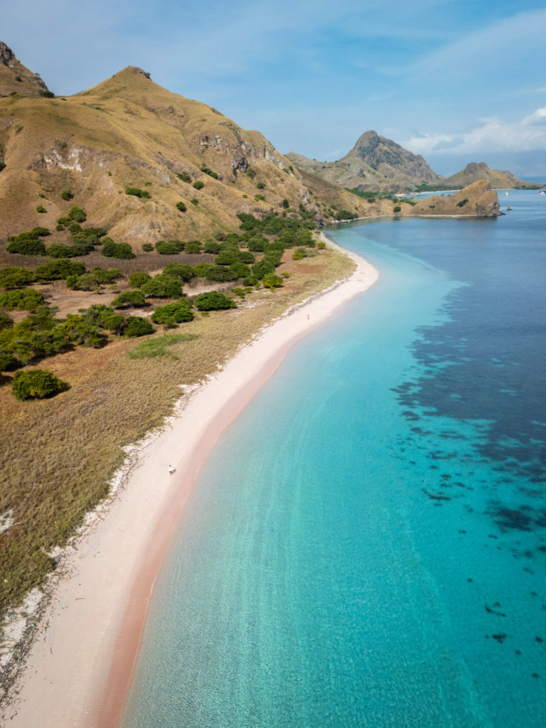 Pink beach drone aerial view