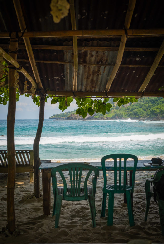 Chairs facing the beach on Koka Beach Flores