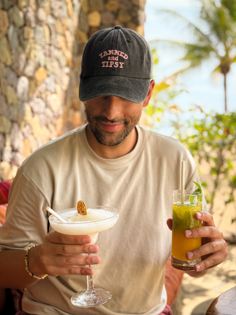 David enjoying cocktails at the Sudamala Komodo Resort in Labuan Bajo.