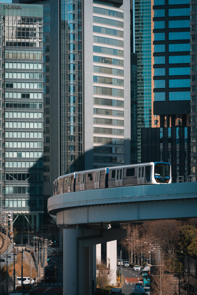 Metro in between highlight buildings Tokyo
