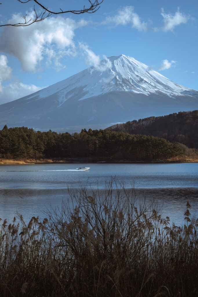 Boat on Lake Kawaguchiko with mount Fuji in the background