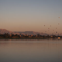 Hot air balloons over the Nile in Luxor during sunrise