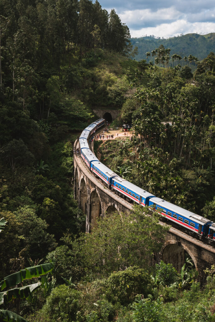 Train crossing the Nine Arches bridge in Ella seen from Asanka cafe