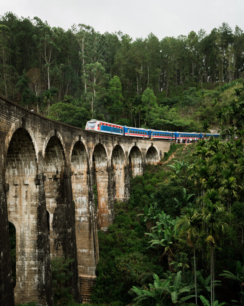 Train crossing the Nine Arches bridge in Ella