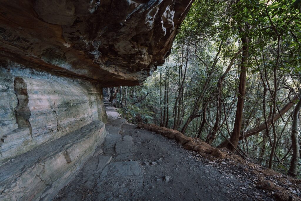 Trail going underneath the rocks