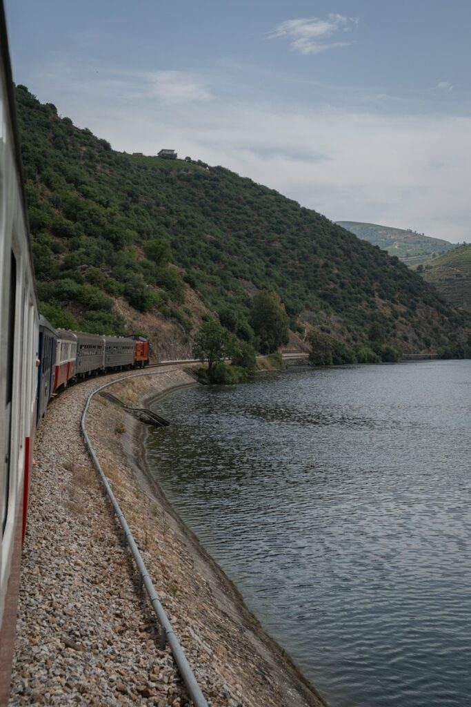 Train passing right by the Douro river